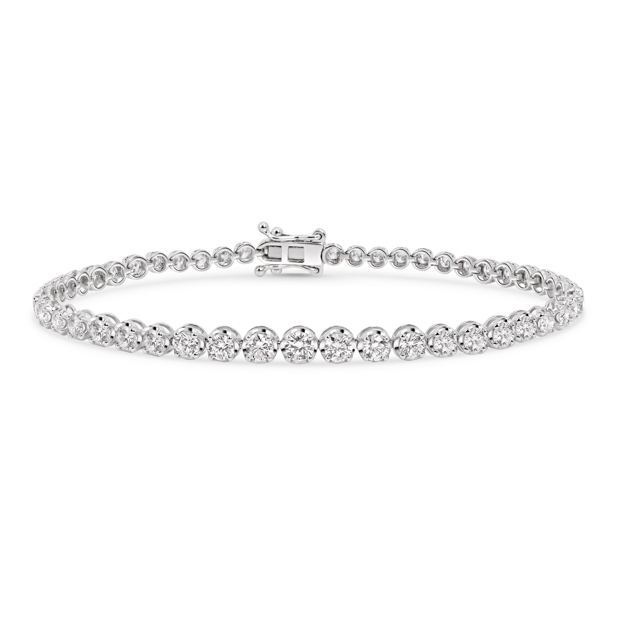 Tennisarmband mit Diamantenverlauf in 18 Karat Gold und natürlichen Brillianten.